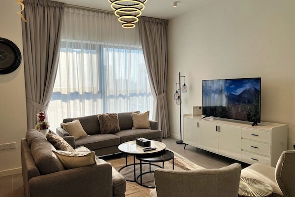 Embrace the charm of our inviting living space, a fusion of modern elegance and cozy comfort.
