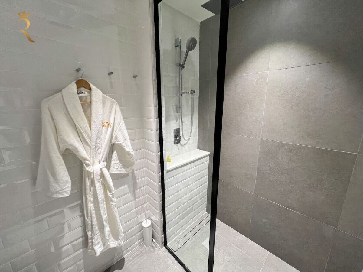Experience the epitome of modern elegance in our meticulously designed bathroom, where form and function harmoniously coexist.