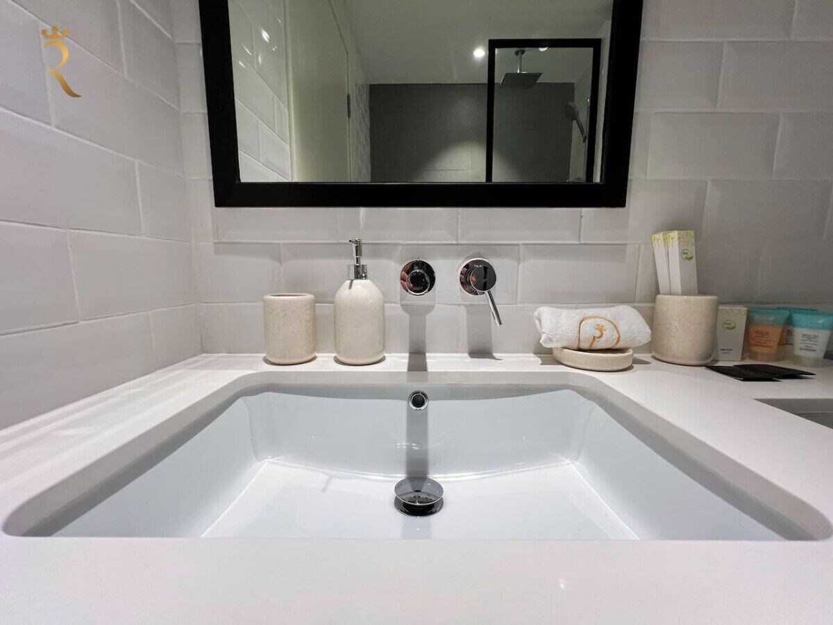Pamper yourself in our thoughtfully curated modern bathroom, a space designed to elevate your daily routine into a spa-like escape.