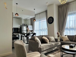 TV - Americana 1BR Apartment Al reem (Abu Dhabi)