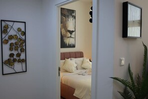 1 dormitorio, tabla de planchar con plancha, cuna de viaje y wifi