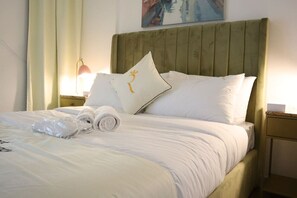 2 habitaciones, tabla de planchar con plancha, cuna de viaje y wifi