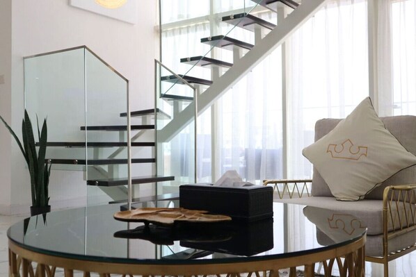 Chic accents and elegant furnishings create a luxurious yet welcoming atmosphere.