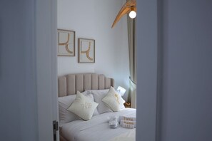 1 habitación, tabla de planchar con plancha, cuna de viaje y wifi