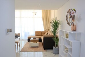 Bright and airy living space with modern furnishings, perfect for your downtime.
