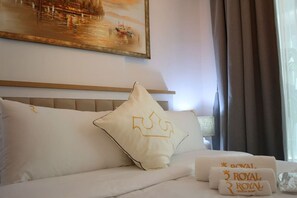 1 habitación, tabla de planchar con plancha, cuna de viaje y wifi 