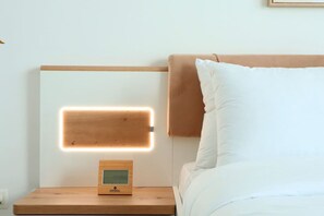1 habitación, tabla de planchar con plancha y cuna de viaje 