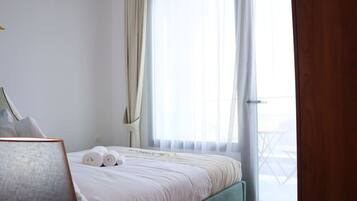 2 habitaciones, tabla de planchar con plancha, cuna de viaje y wifi