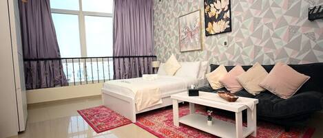 1 habitación, tabla de planchar con plancha, cuna de viaje y wifi