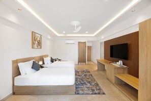 In-room safe, desk, laptop workspace, blackout curtains - White Wharf Beach Resort Morjim Goa (Morjim)