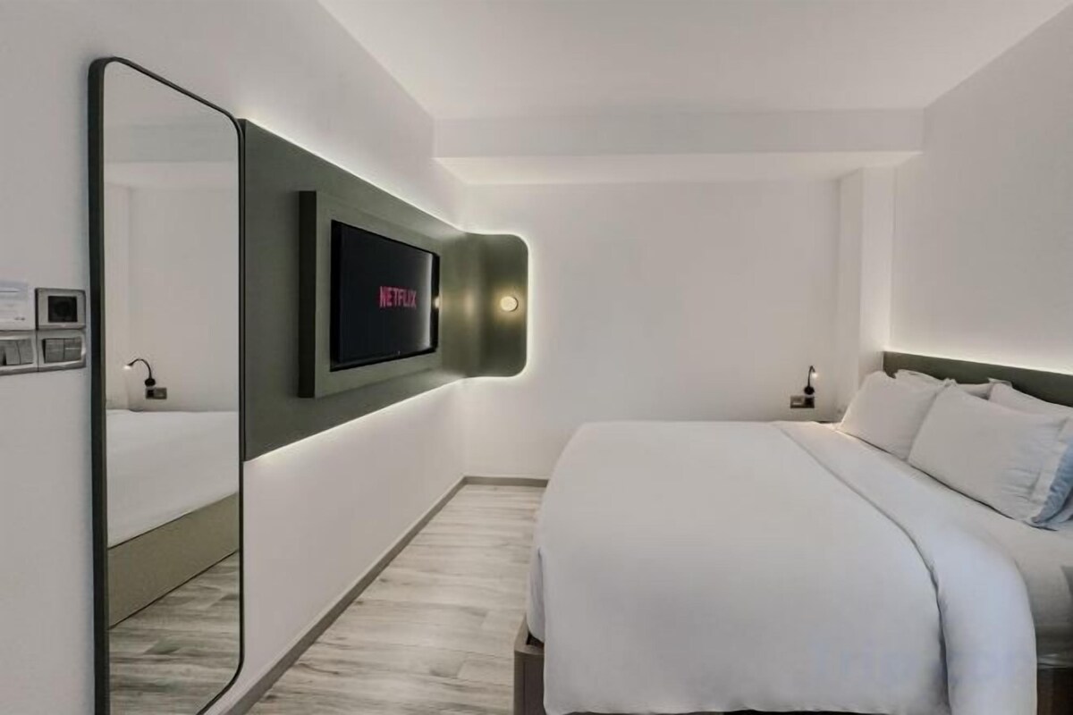 In-room safe, desk, blackout curtains, iron/ironing board