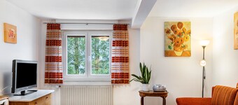 Appartement "Edith" avec vue sur les montagnes, jardin partagé et Wi-Fi