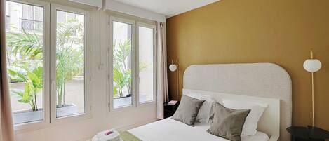 1 bedroom, desk, iron/ironing board, travel cot