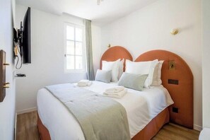 1 dormitorio, tabla de planchar con plancha, cuna de viaje y wifi gratis
