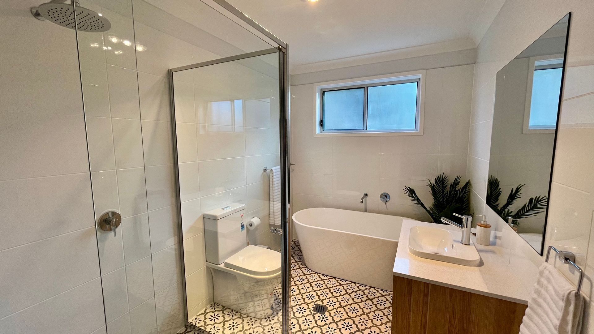 Shower, hair dryer, towels