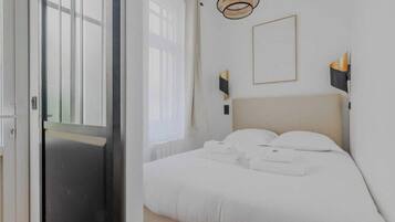 Desk, iron/ironing board, WiFi (free), bed sheets