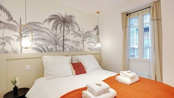 1 slaapkamer, een strijkplank/strijkijzer, internet, beddengoed