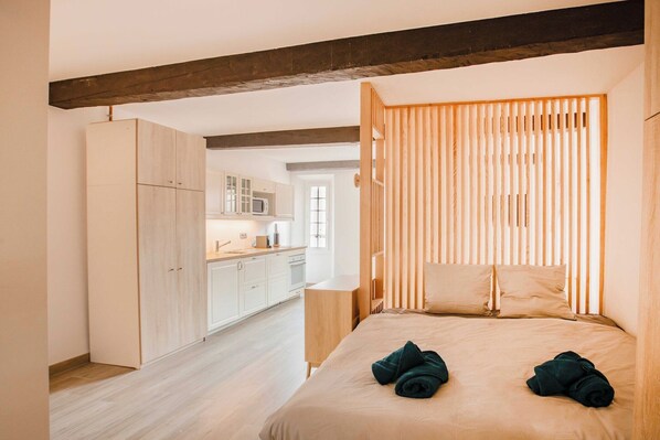 1 bedroom, desk, iron/ironing board, travel crib