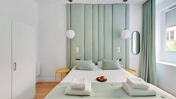 1 bedroom, desk, iron/ironing board, travel cot