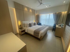 Deluxe Room | In-room safe, desk, laptop workspace, blackout curtains - Galaxy Beacon Hotel (Mumbai)