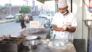 A street food vendor preparing food at a roadside stall. - Atithi Hotel and Dhaba (Panipat)