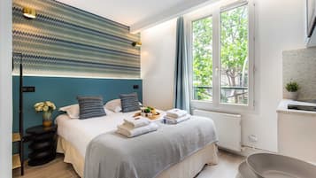 Een strijkplank/strijkijzer, gratis wifi, beddengoed