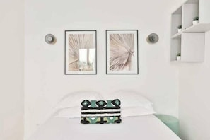 1 bedroom, desk, iron/ironing board, travel crib