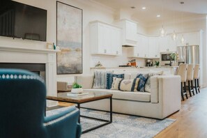 Smart TV, fireplace, books