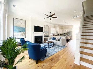 Smart TV, fireplace, books