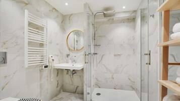 Shower, hair dryer, towels