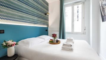 StrykjÀrn/strykbrÀda, gratis wi-fi och sÀngklÀder