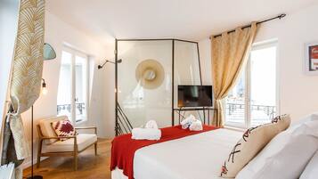 1 bedroom, desk, iron/ironing board, travel crib