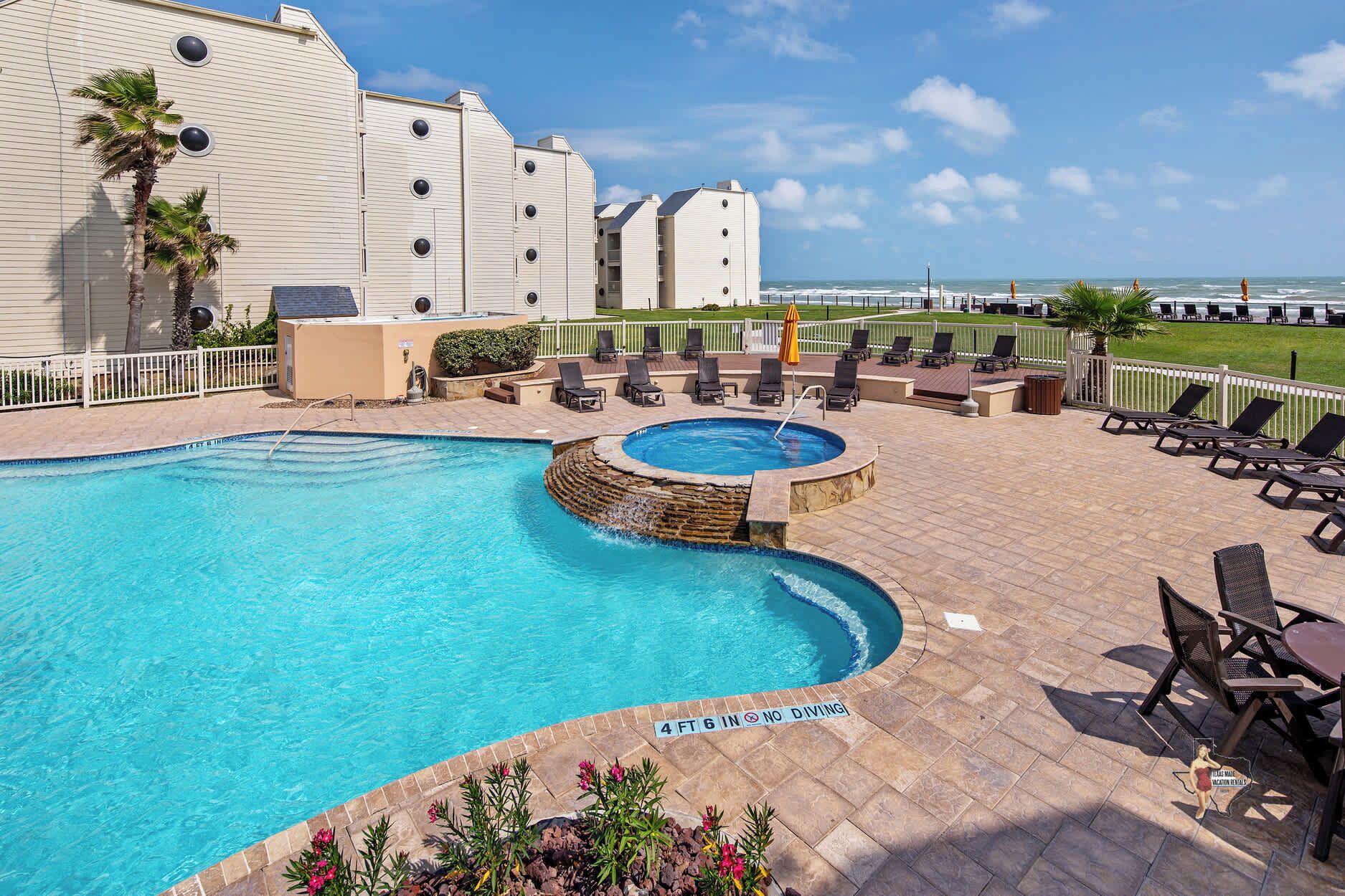 Enjoy the pool and hot tub with a beautiful ocean view! 