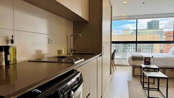 Fridge, microwave, stovetop, coffee/tea maker