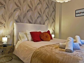 1 habitación, tabla de planchar con plancha, wifi gratis y ropa de cama 