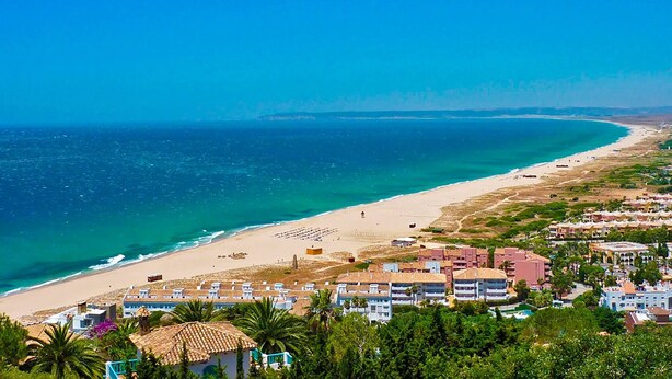 A coastal resort with beachfront villas, a sandy beach, and a clear view of the ocean. - Zahara Paradise - Ole Solutions (Zahara de los Atunes)
