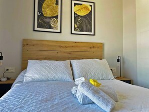1 habitación, tabla de planchar con plancha, wifi gratis y ropa de cama 