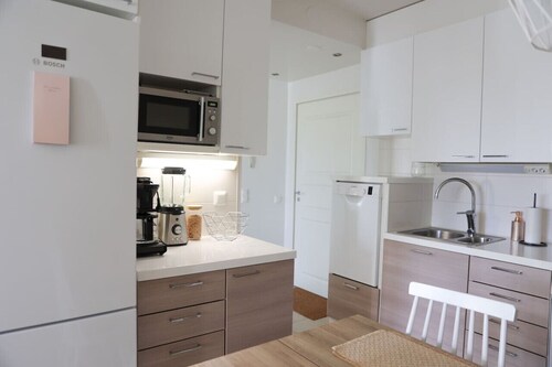 Aurora City Apartment with Sauna by BookLapland