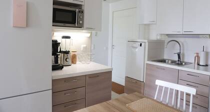 Aurora City Apartment with Sauna by BookLapland