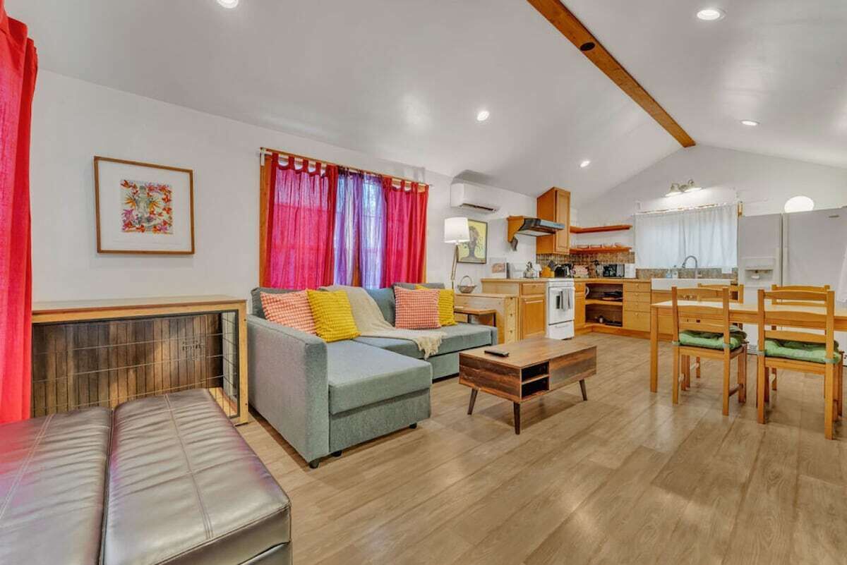 Spacious living area opens to the dining room and kitchen, perfect for gathering