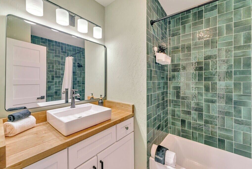 Bathroom with Designer Green Tile & Wood Vanity