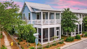 A two-story building with a balcony and large windows, surrounded by greenery and a fire hydrant. - Watercolor! Next to Dragonfly Pool, LSV, + 4 Bikes! Serene Location! (Santa Rosa Beach)