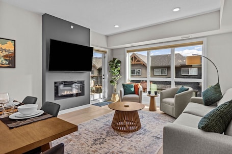 Smart TV, fireplace. Mountain Views | Heated Pool & Hot Tub | Top Floor