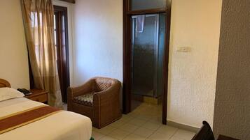 Standard Single Room, City View | In-room safe, desk, laptop workspace, iron/ironing board