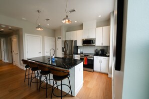 Fridge, microwave, dining tables