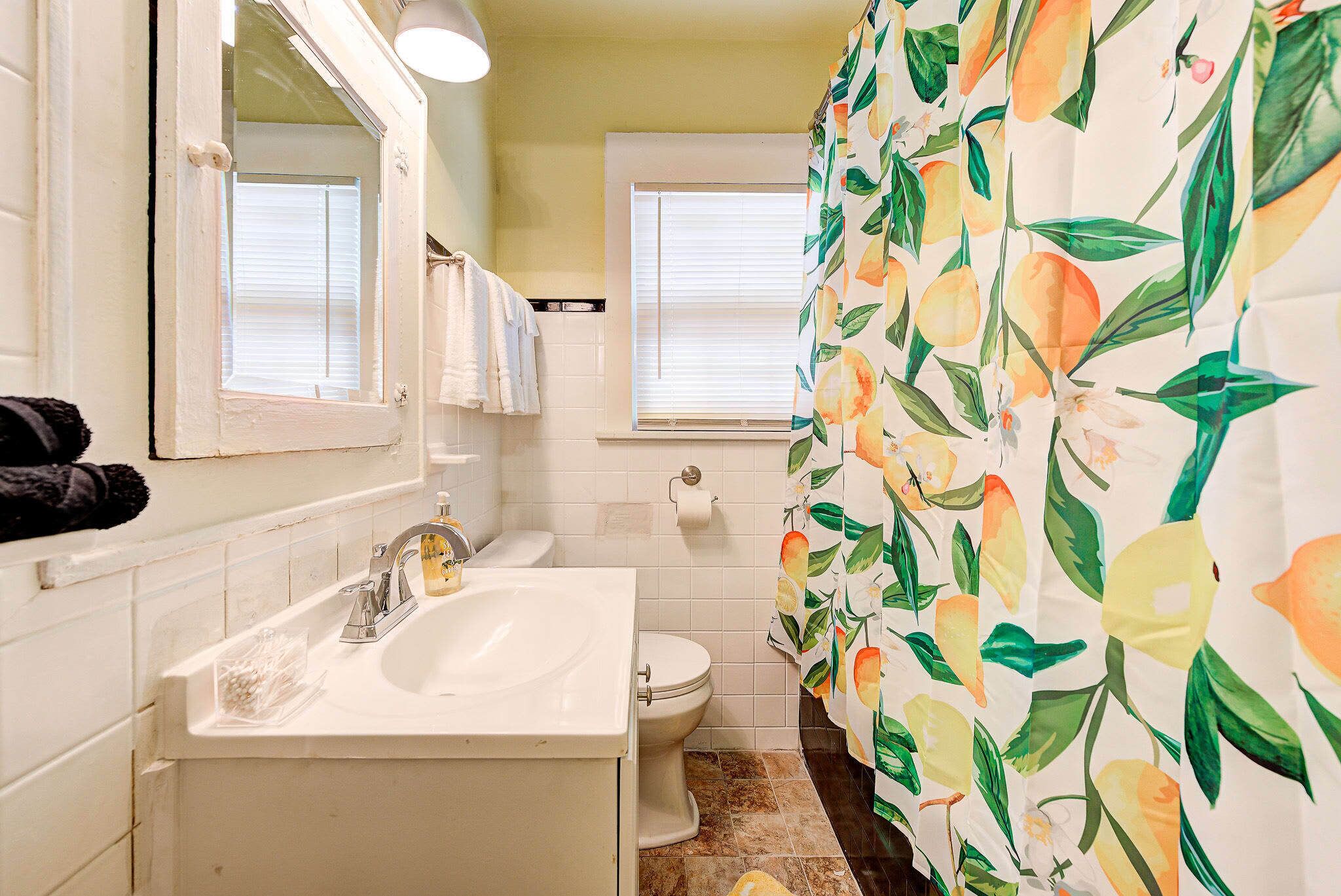 Shower, hair dryer, towels, shampoo