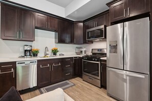 Apartment, 1 Bedroom | Private kitchen | Fridge, oven, coffee/tea maker