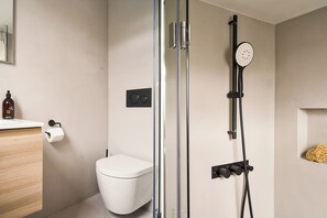 Eco-friendly toiletries, hair dryer, towels