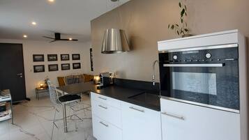 Comfort Apartment | Private kitchen | Mini-fridge, microwave, espresso maker, coffee/tea maker