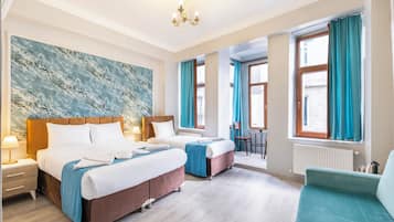 Deluxe Triple Room, City View | Soundproofing, free WiFi